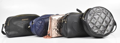 Lot 382 - MOSCHINO; four fashion handbags and a black...