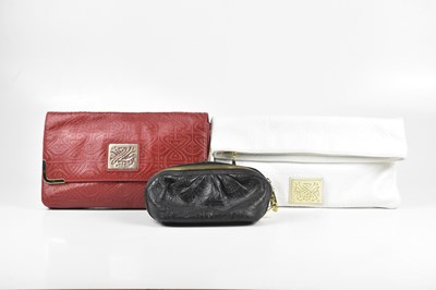 Lot 358 - BIBA; a white embossed leather foldover clutch...