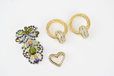 Lot 197 - CHRISTIAN DIOR; a pair of heavy gold tone clip-...