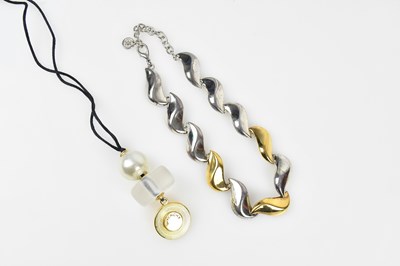 Lot 240 - GIVENCHY; a heavy silver and gold tone choker...