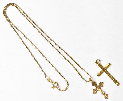 Lot 1252 - A 9ct yellow gold crucifix pendant, on a chain...