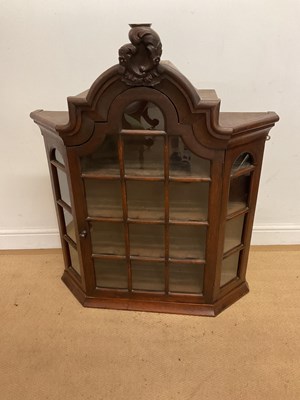 Lot 928 - A stained pine wall mounted cabinet, with...