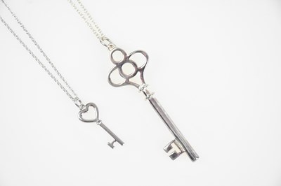 Lot 244 - TIFFANY & CO; a sterling silver key pendant...