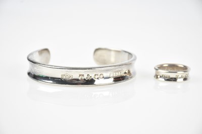 Lot 202 - TIFFANY & CO; a sterling silver bracelet from...