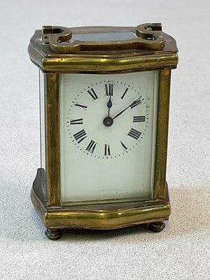 Lot 828 - A c1900 French brass cased carriage clock of...