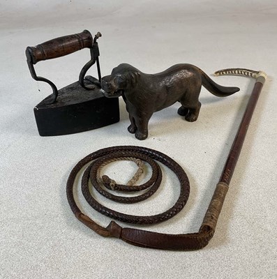 Lot 58 - A brass nutcracker in the form of a dog,...