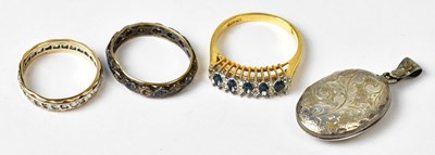 Lot 1172 - A 9ct gold eternity ring set with white stones,...