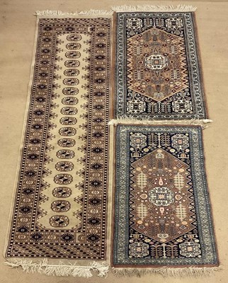 Lot 844 - A pair of Eastern hand knotted rugs and a...
