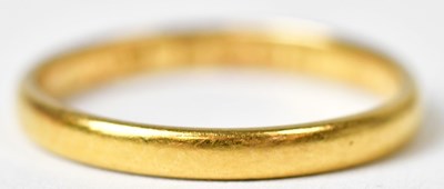 Lot 1128 - A 22ct gold wedding band, size J, approx 1.9g.