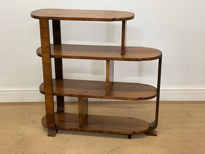 Lot 868 - An Art Deco walnut whatnot/bookcase of stepped...