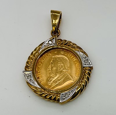 Lot 677 - A South African 1/10oz 1991 Krugerrand, set in...