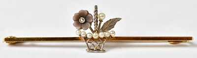 Lot 1217 - A 15ct gold brooch set with pearls in the form...