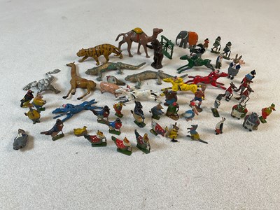 Lot 254 - A collection of lead farm and zoo figures, to...