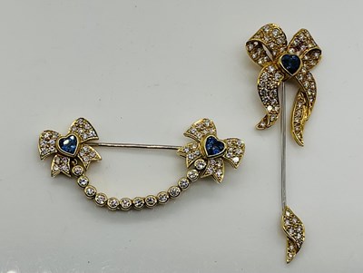 Lot 659 - An 18ct yellow and white gold diamond and...