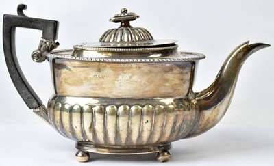 Lot 1062 - A George III hallmarked silver teapot, with...
