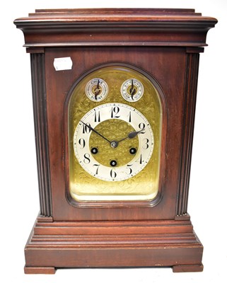 Lot 129 - An Edwardian mahogany eight-day mantel clock,...