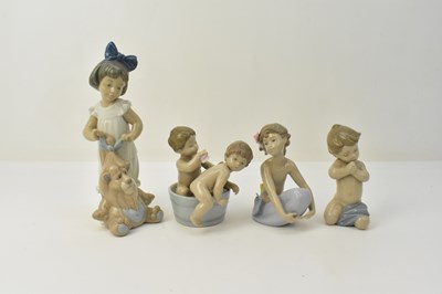 Lot 160 - LLADRÓ; two high glazed porcelain figures,...