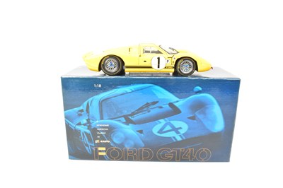 Lot 467 - EXOTO; a 1:18 diecast model of a Ford GT40 Mk...