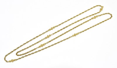 Lot 1319 - A yellow metal rope twist chain with shaped...