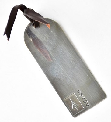 Lot 1056 - CONCORDE; a hallmarked silver luggage tag by...