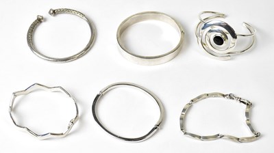 Lot 1213 - Two 925 silver hinged bangles, comprising a...