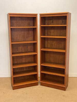 Lot 876 - A pair of 1970s Danish teak open book shelves...
