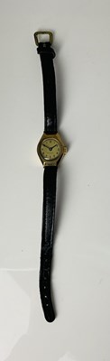 Lot 818 - A lady's vintage 9ct gold cased wristwatch,...