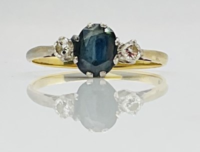 Lot 693 - An 18ct yellow gold sapphire and diamond three...