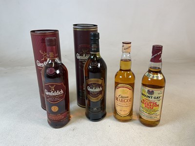 Lot 337 - WHISKY AND RUM; two bottles of Glenfiddich...