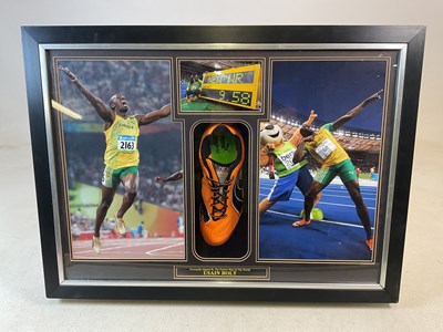 Lot 457 - USAIN BOLT; a signed Puma running shoe, box...