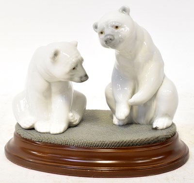 Lot 162 - LLADRÓ; two figures of seated polar bears, on...