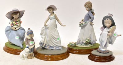 Lot 158 - LLADRÓ; five figures comprising a girl with...