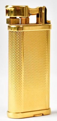 Lot 794 - DUNHILL; a gold-plated Rollagas lighter, model...