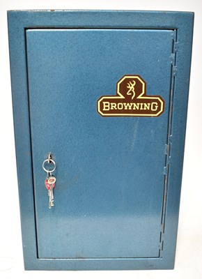 Lot 1025 - A blue painted metal ammunition cabinet, with...