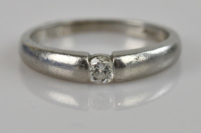 Lot 2464 - A platinum diamond solitaire dress ring, the...