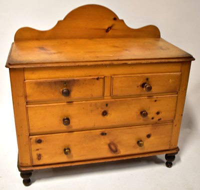 Lot 35 - A Victorian pine washstand with scroll back...