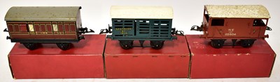 Lot 398 - HORNBY; three boxed O gauge vans, no. R164...