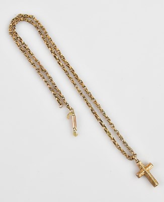 Lot 2125 - A 9ct yellow gold crucifix, suspended on a...