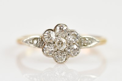 Lot 2393 - A yellow and white metal diamond set cluster...