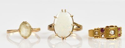 Lot 2460 - A 15ct yellow gold seed pearl and red stone...