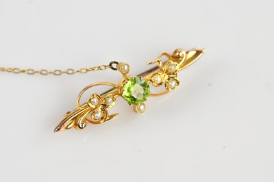 Lot 1336 - A yellow metal seed pearl and peridot set...