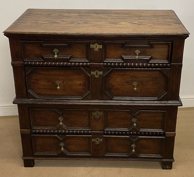 Lot 885 - An oak two section chest of drawers, the upper...