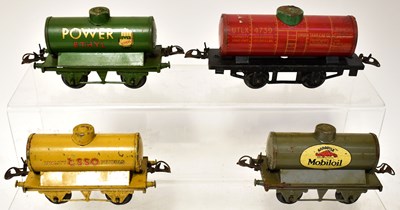 Lot 406 - HORNBY; four O gauge tin-plate wagons,...