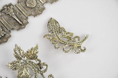 Lot 1081 - A hallmarked silver charm bracelet with...