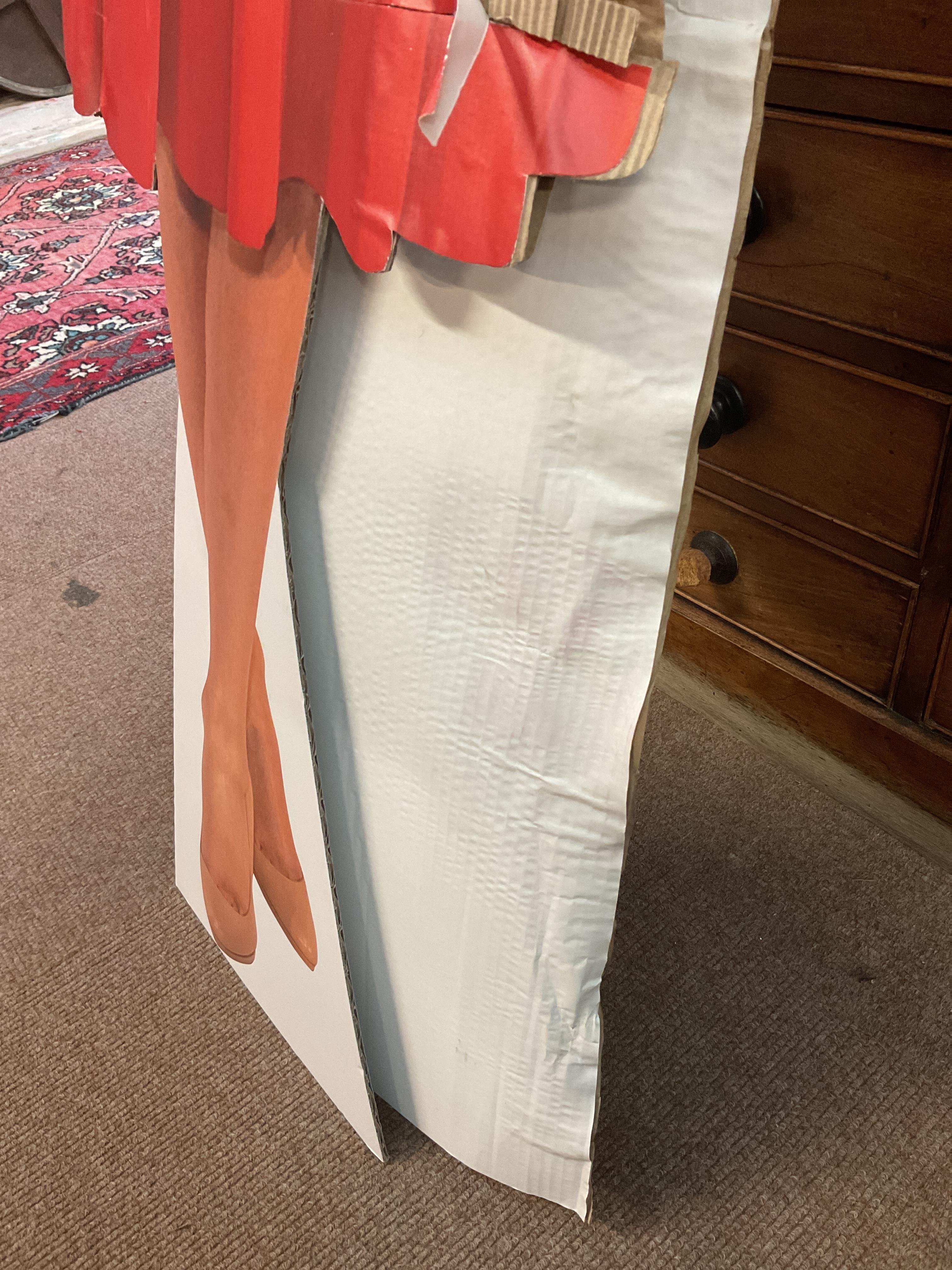 Beloved UK Taylor Swift cardboard cutout auctioned for charity in