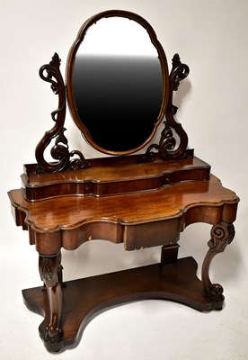Lot 27 - A Victorian mahogany dressing table, with...