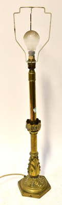 Lot 98 - A 19th century brass table lamp with acanthus...