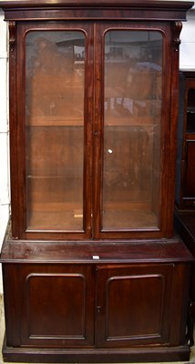 Lot 61 - A Victorian mahogany breakfront bookcase, with...