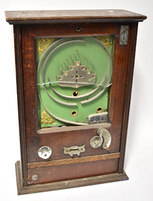 Lot 647 - A Victorian oak cased wall-mounting penny slot...