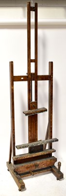 Lot 89 - A large studio easel, height 230cm.